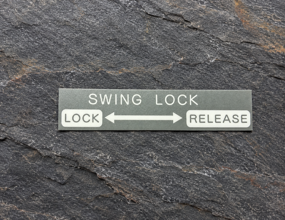 TADANO PLATE, NAME  SWING LOCK/RELEASE | PN 34381110121